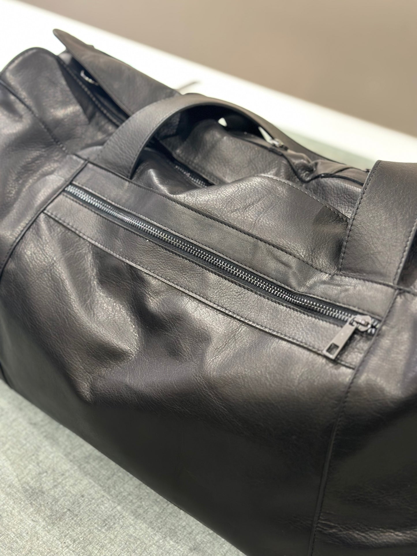 “Prestige 5-Pocket Leather Duffel Bag”
