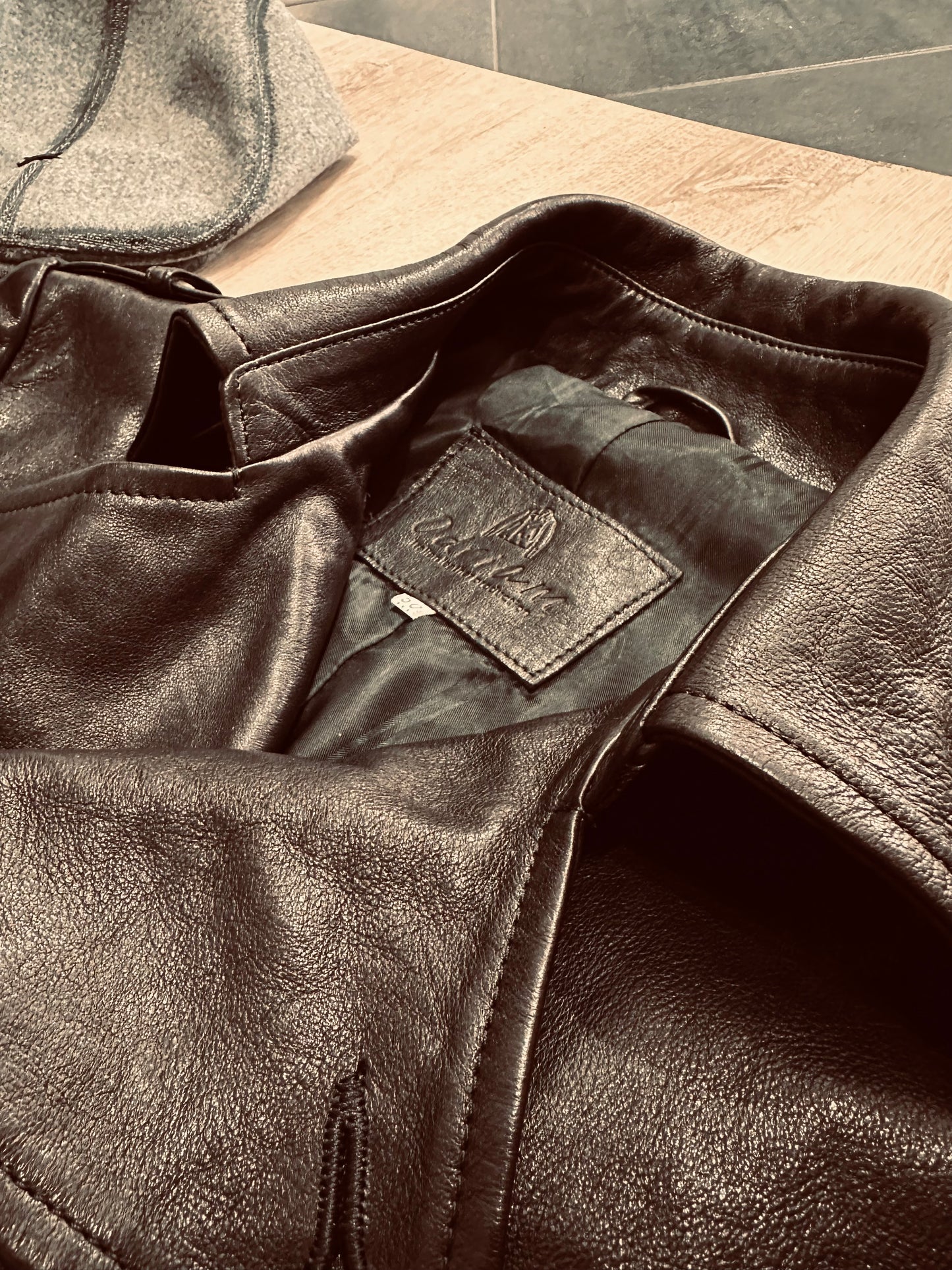 “Heritage Trench” trench coat in washed leather