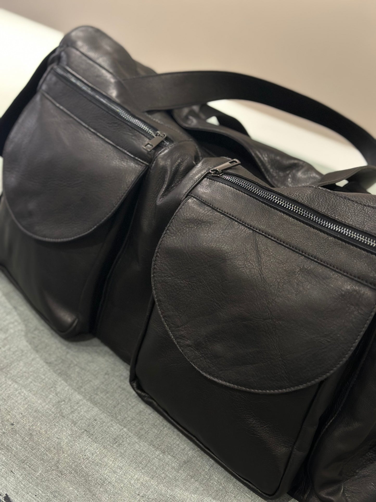 “Prestige 5-Pocket Leather Duffel Bag”