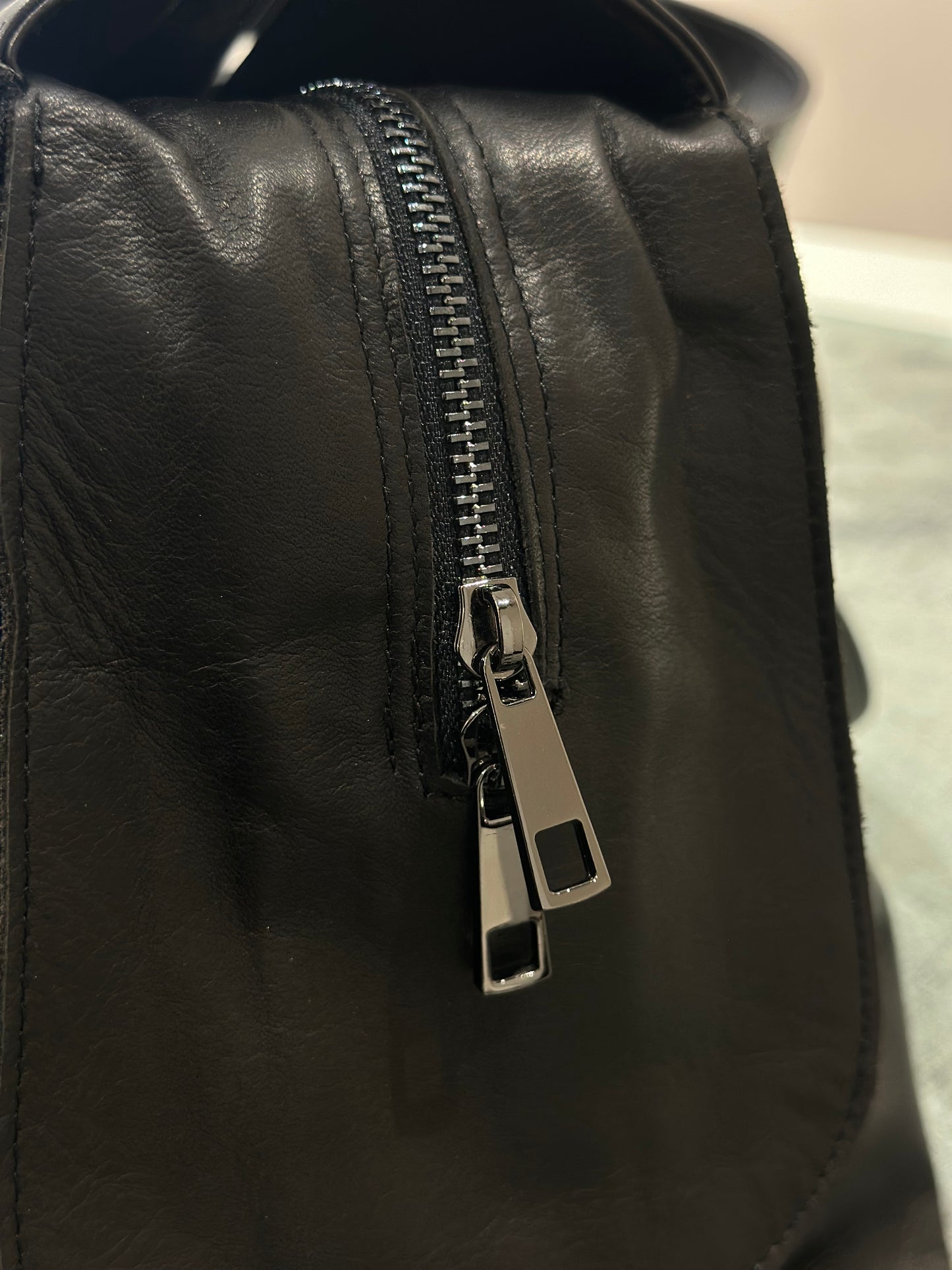 “Prestige 5-Pocket Leather Duffel Bag”