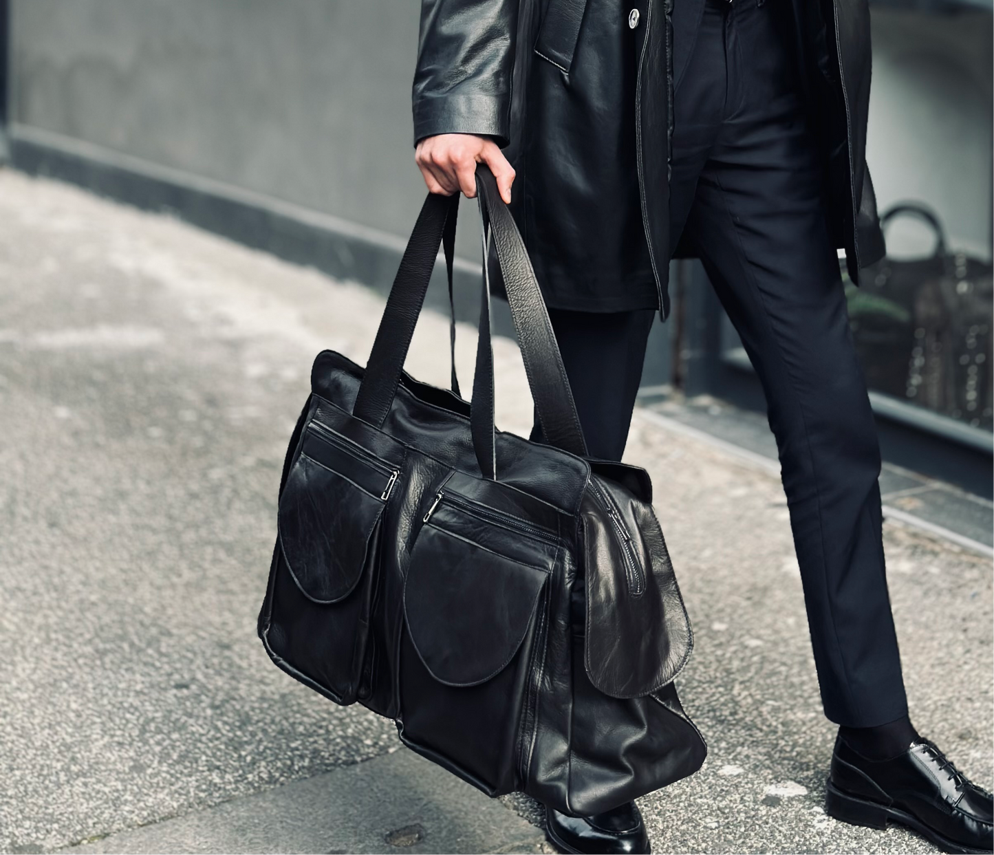 “Prestige 5-Pocket Leather Duffel Bag”