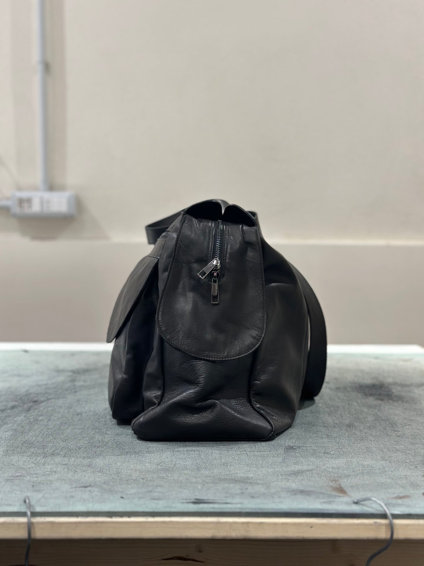 “Prestige 5-Pocket Leather Duffel Bag”