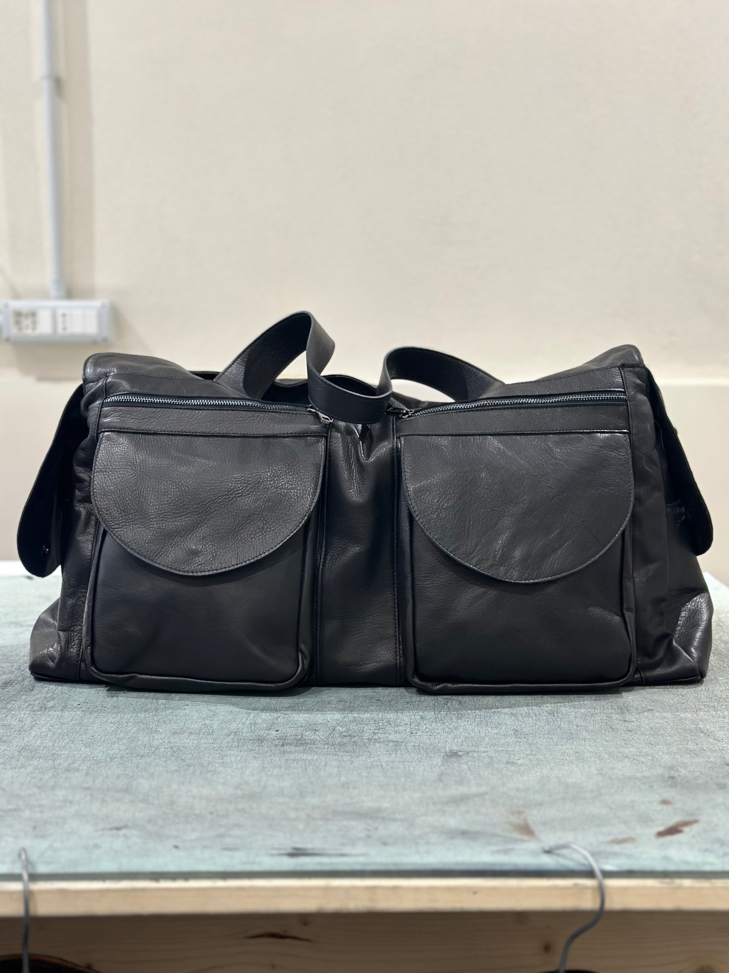 “Prestige 5-Pocket Leather Duffel Bag”