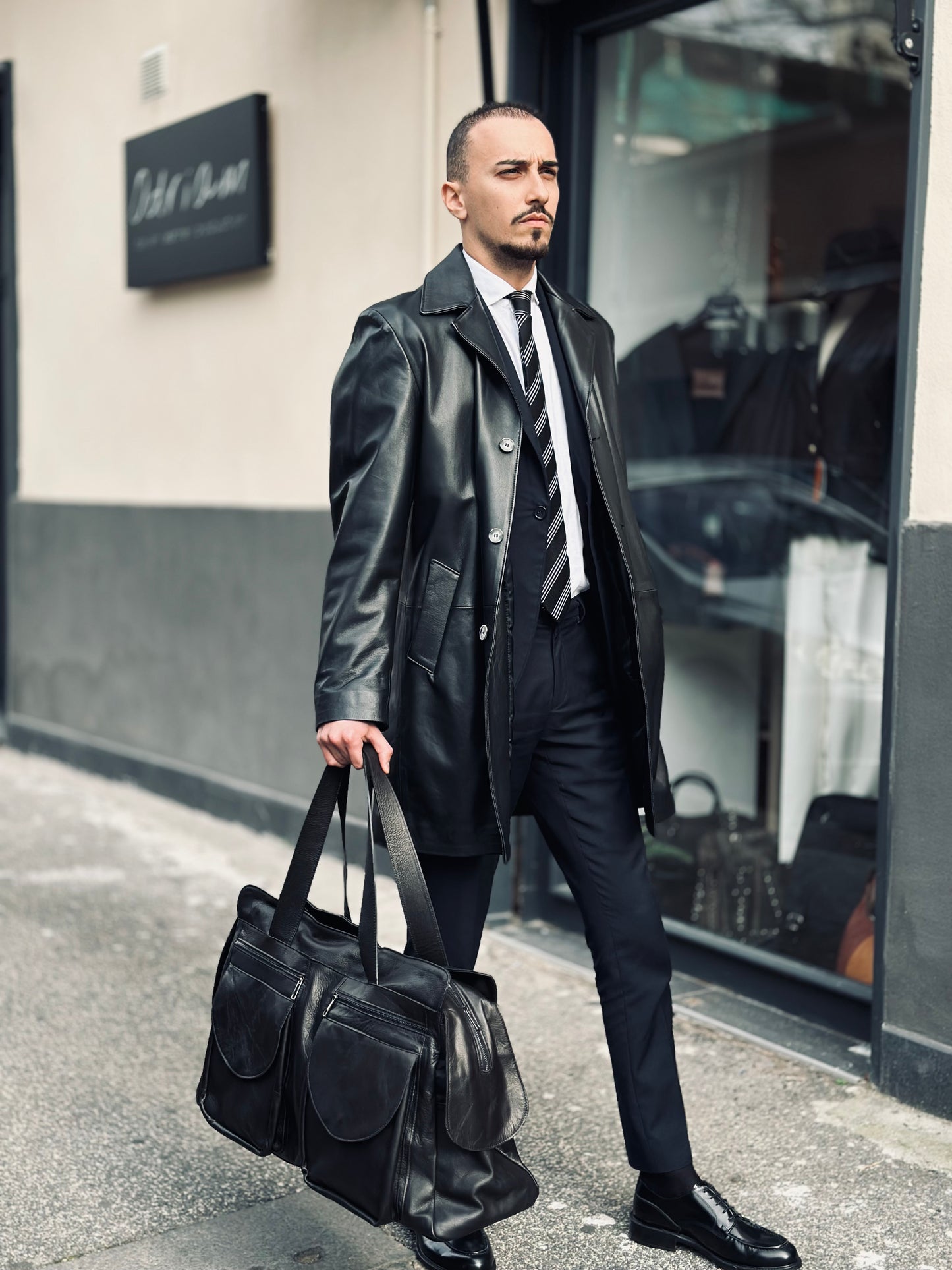 “Prestige 5-Pocket Leather Duffel Bag”